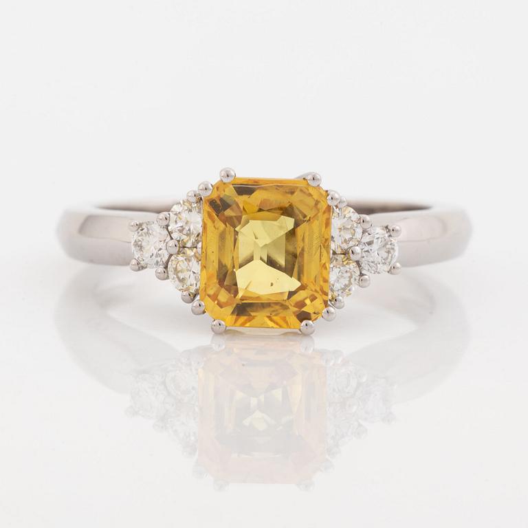 Yellow sapphire and diamond ring.