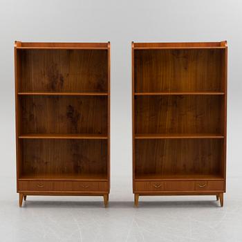 A pair of teak veneered shelves, mid 20th century.