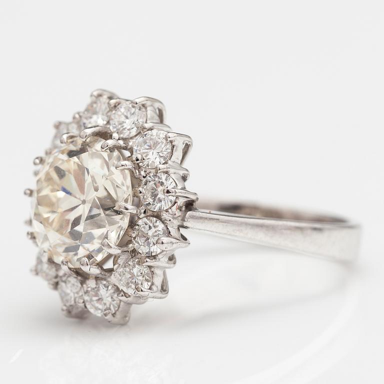 An 18K white gold ring with an old cut diamonds and brilliant cut diamonds ca. 3.68 cts in total. Hallmarked HEG.