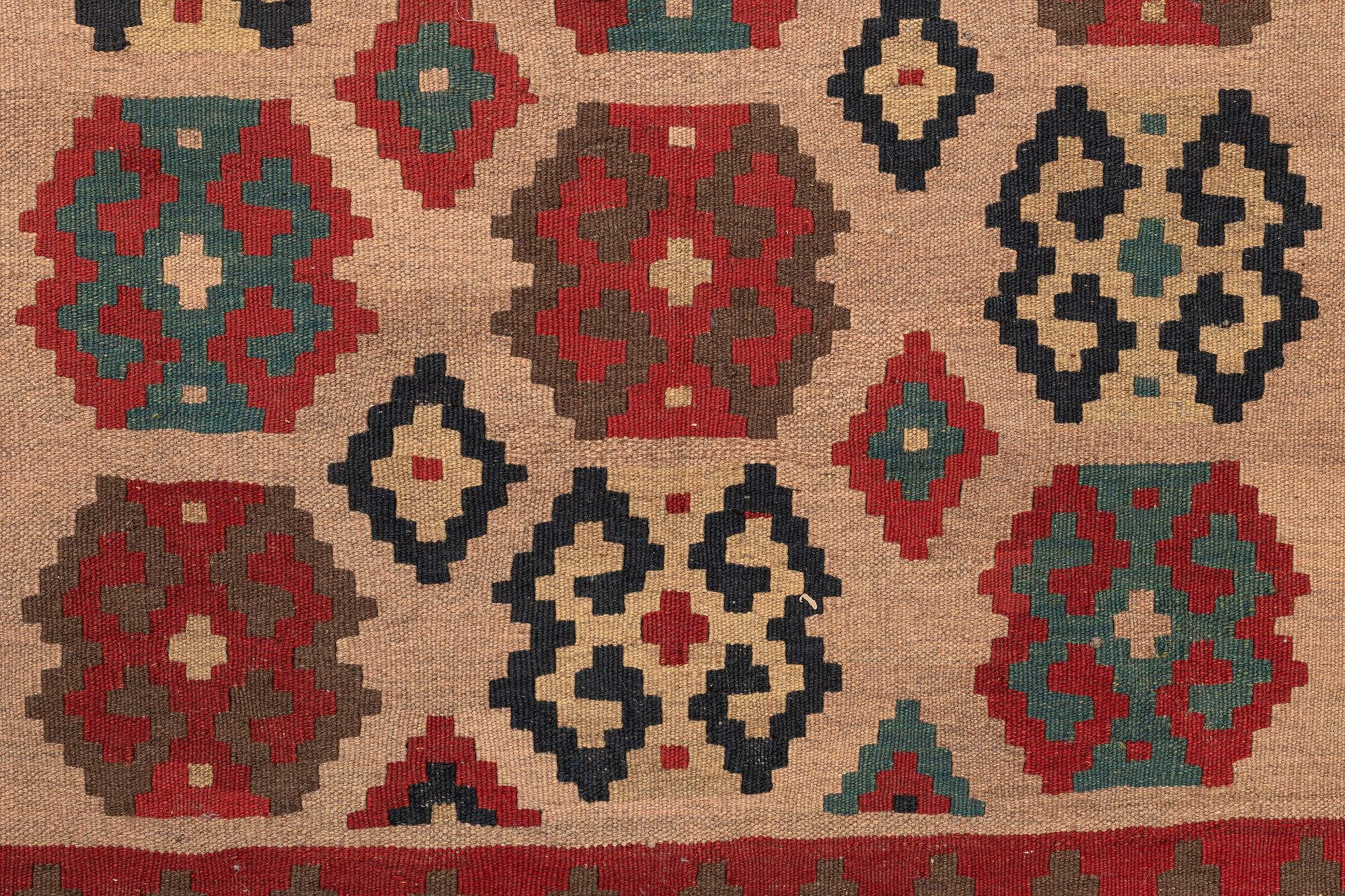 A carpet, a kilim, probably Veramin, ca 153 x 121,5 cm.