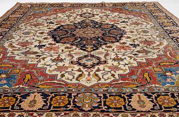 An antique Tabriz carpet, c. 365 x 280 cm.