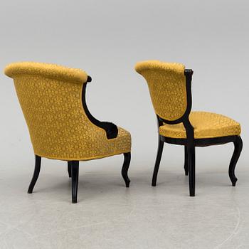 A set of three chairs, two easy chairs, one sofa and one table, end of the 19th century.