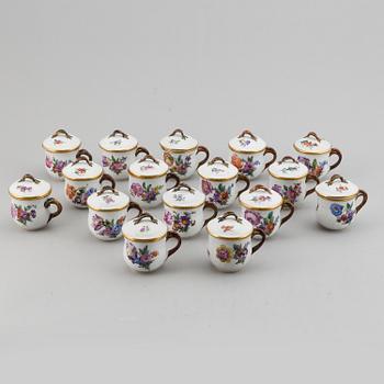 A set of 16 Royal Copenhagen custard cups with covers, Denmark, 20th Century.