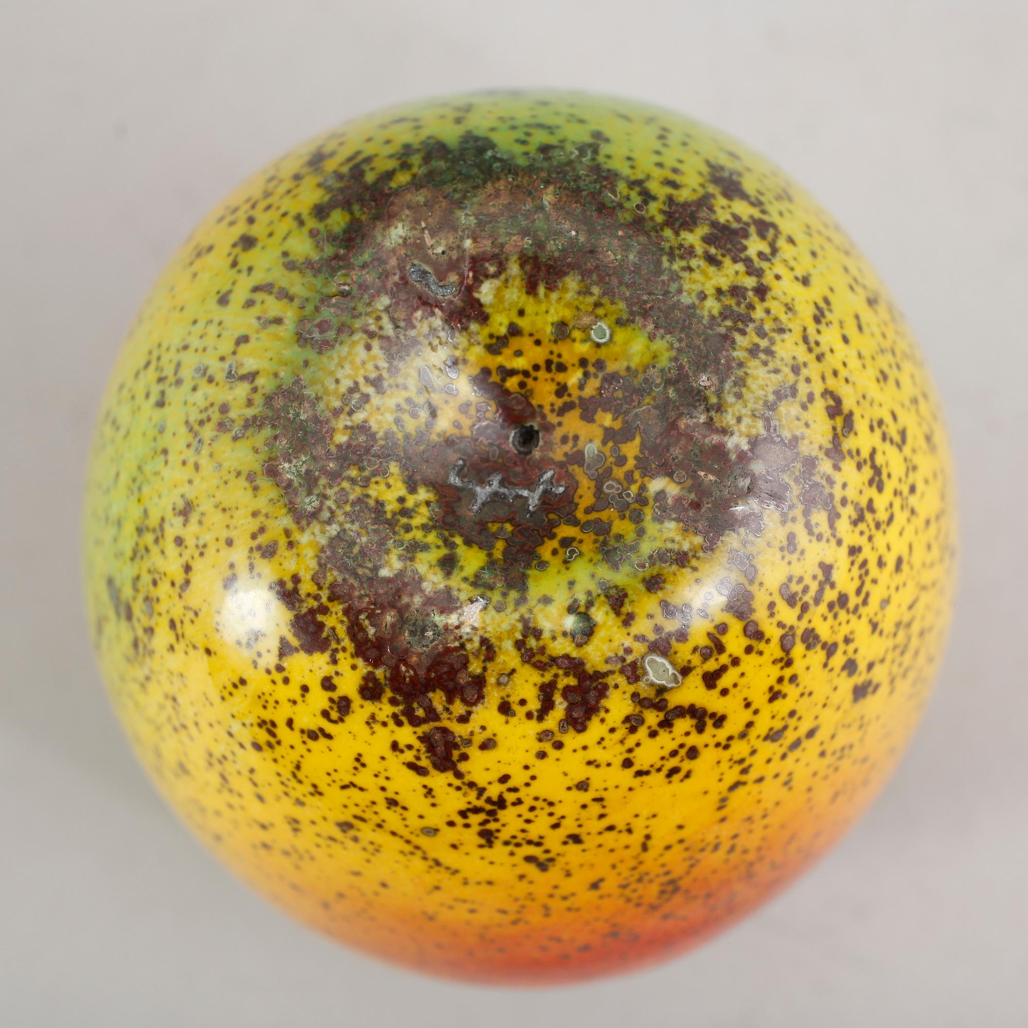 A Hans Hedberg faience apple, Biot, France.