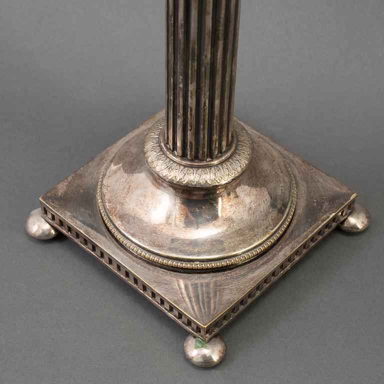 GULDSMEDSAKTIEBOLAGET (GAB), Ljusstakar, nysilver, Gustaviansk stil, 1900-talets första hälft.