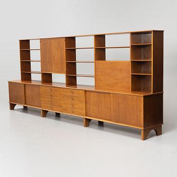 Josef Frank, a mahogny sideboard with cabinets, shelves, writing flap and drawers, Svenskt Tenn, a special commission, 1940-50s.