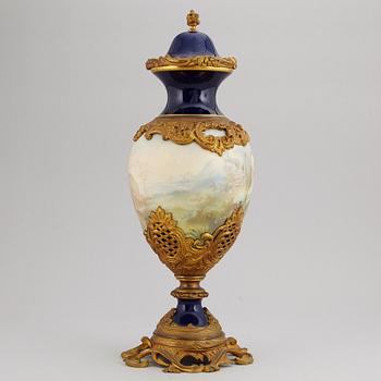 A bronze mounted porcelain vase, Sevres like mark, mid 20th Century.