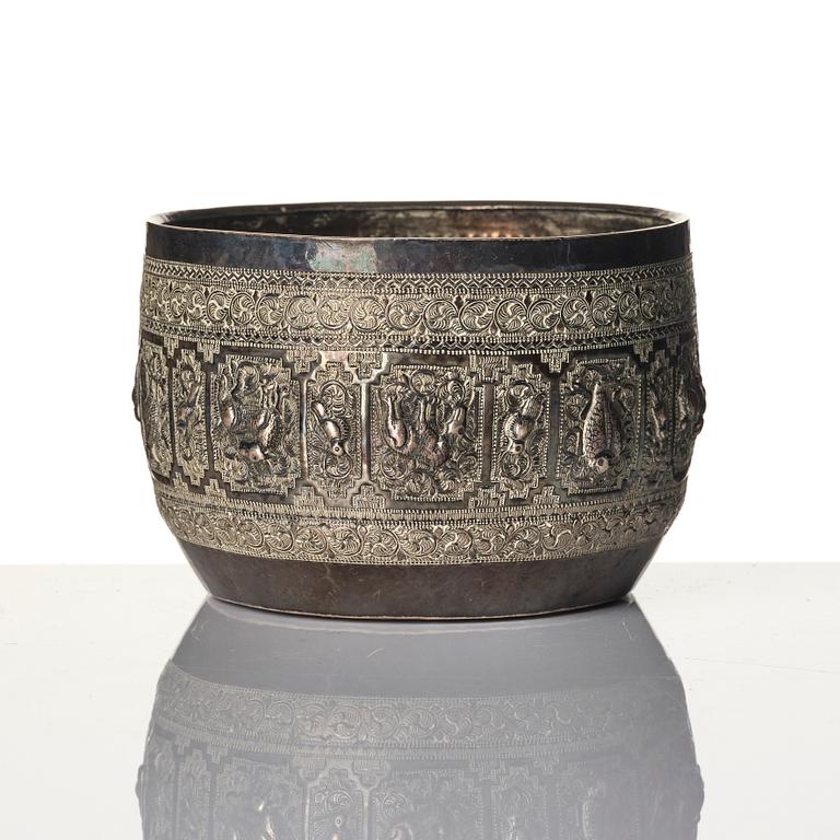 A Chinese brushpot, Qing dynasty, circa 1900. An archaistic bronze ewer and a silvered South East Asian bowl with stand.