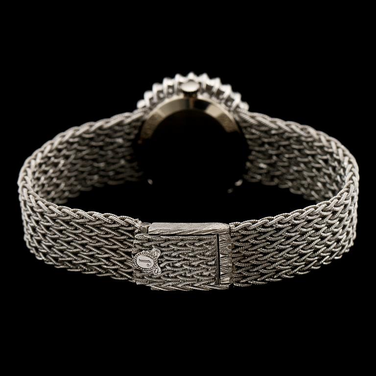 DAMARMBANDSUR, 18k vitguld med 32 briljantslipade diamanter, tot ca 0.96 ct, Juvenia, Schweiz, 1900-tal. Vikt 50 g.