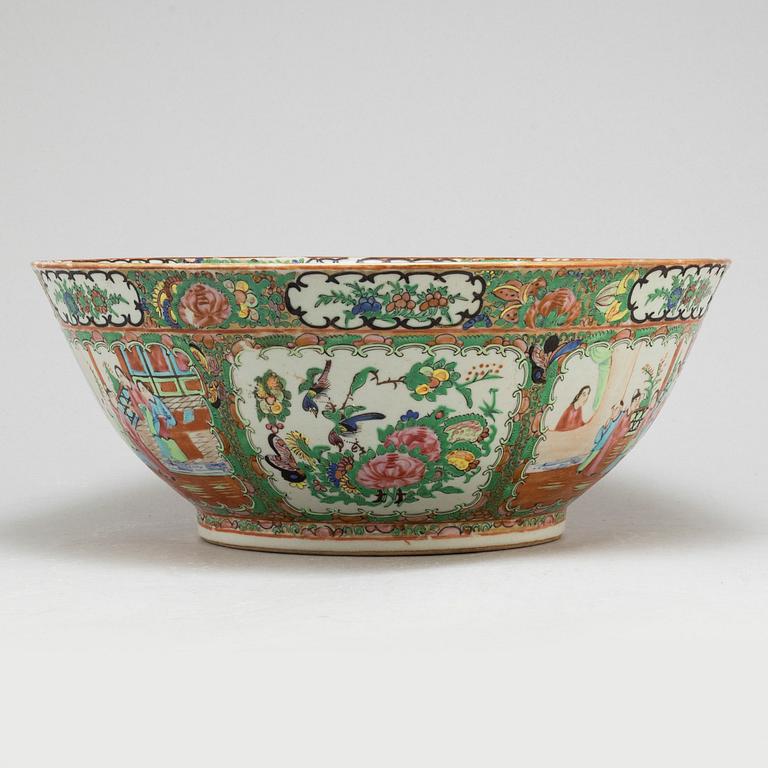 A famille rose 'Canton' punch bowl, Qing dynasty, late 19th century.