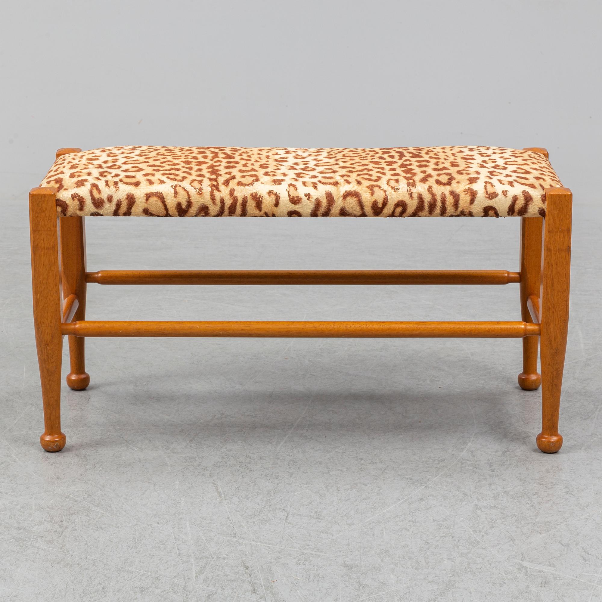 A mahogany bench by Josef Frank for Firma Svenskt Tenn.
