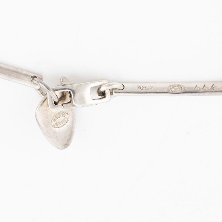 Georg Jensen, a necklace and a pair of earrings, sterling silver.