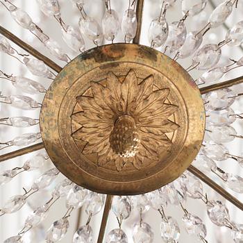 A late Gustavian gilt-brass and cut-glass six-light chandelier, Stockholm, circa 1800.