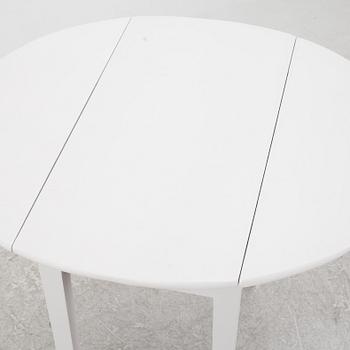 A drop-leaf table, late 19th Century.