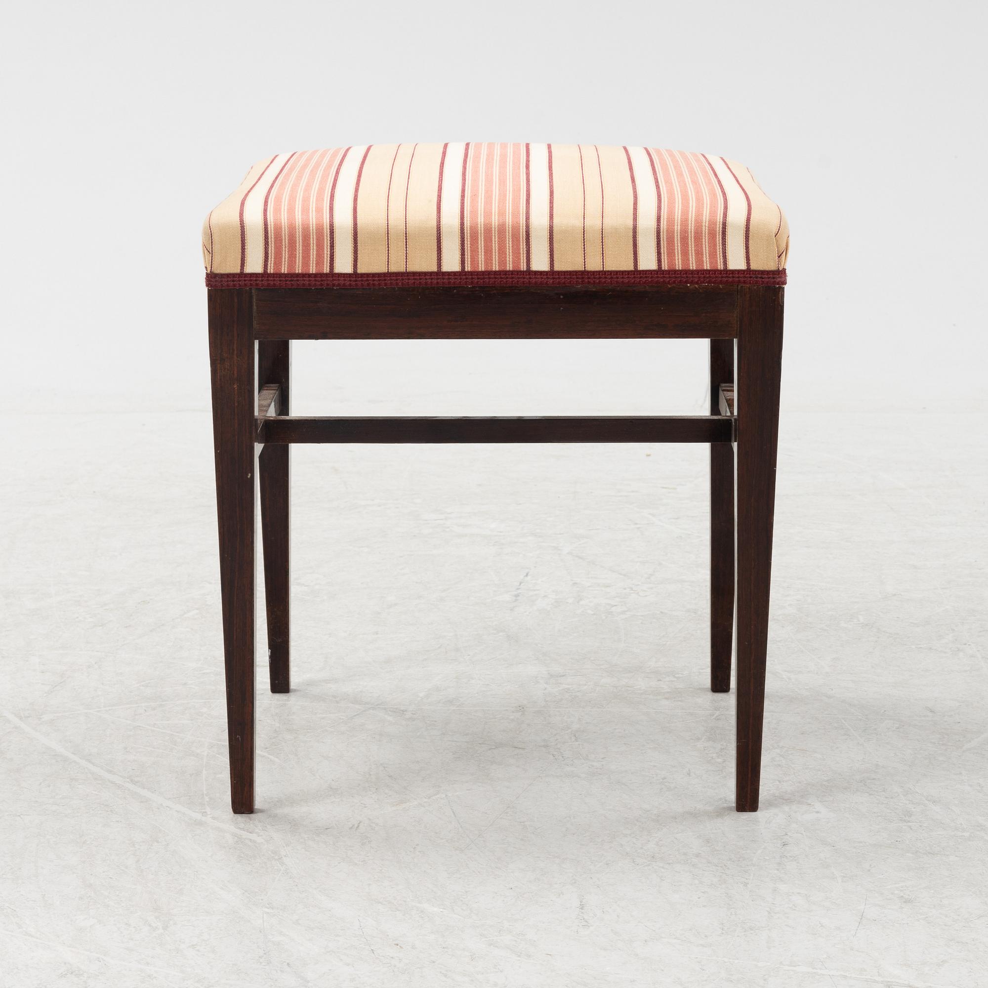 A group of five rosewood veneered chairs and a stool, mid 20th Century.