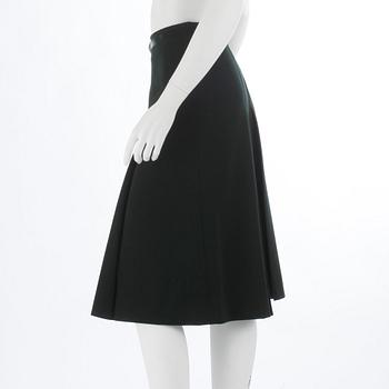 CÉLINE, a green wool skirt, size 48.