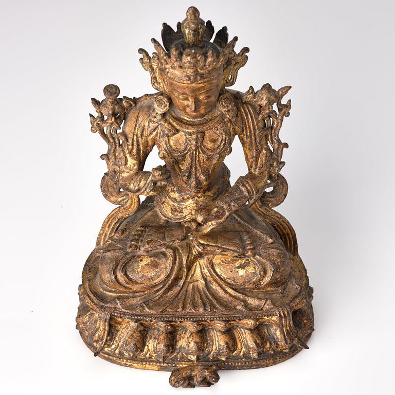 A gold lacquered bronze figure of Bodhisattva, Ming dynasty, mid 15th Century.