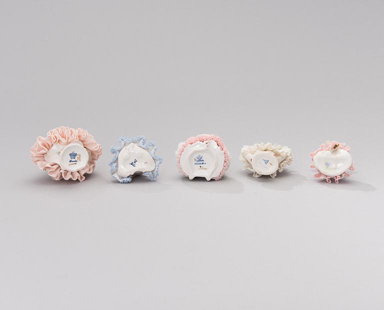 A set of five Dresden porcelain figurines in lace dresses. Mid-20th century.