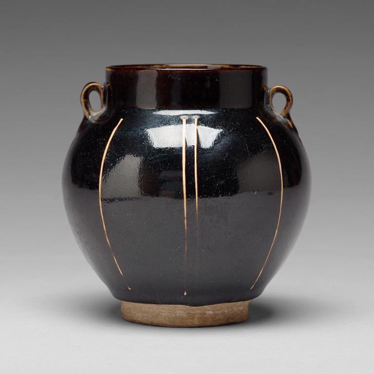 A Henan black glazed ribbed jar, Song dynasty (960-1279).