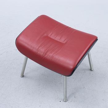 A pair of armchairs with footstool, "Timeout" by Conform, late 20th century.