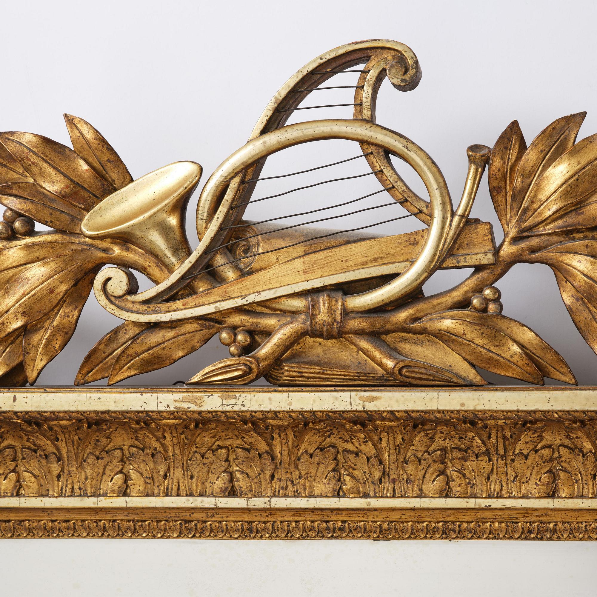 A two-branch Empire giltwood girandole mirror by P. G. Bylander (master in Gothenburg 1811-58).