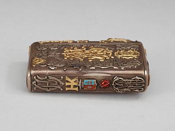 A CIGARRETTE Russian 19th century parcel gilt and enameld cigarette-case, makers mark of Michael Isakov, S.t Petersburg.
