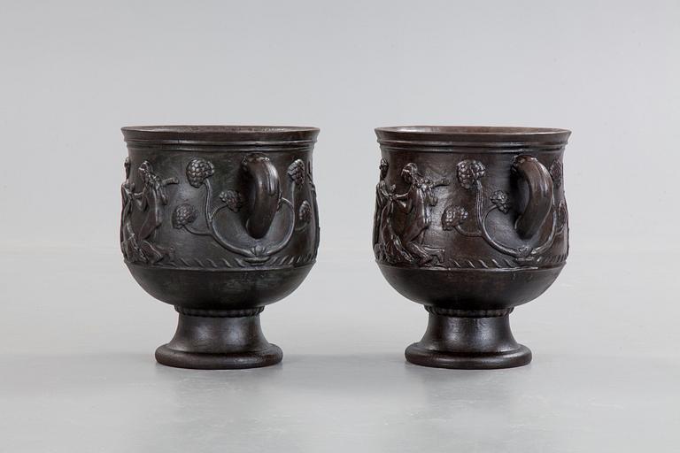 Ivar Johnsson, a pair of Swedish Grace cast iron jardinières, 'Diana' by Näfveqvarn, Sweden 1920's.