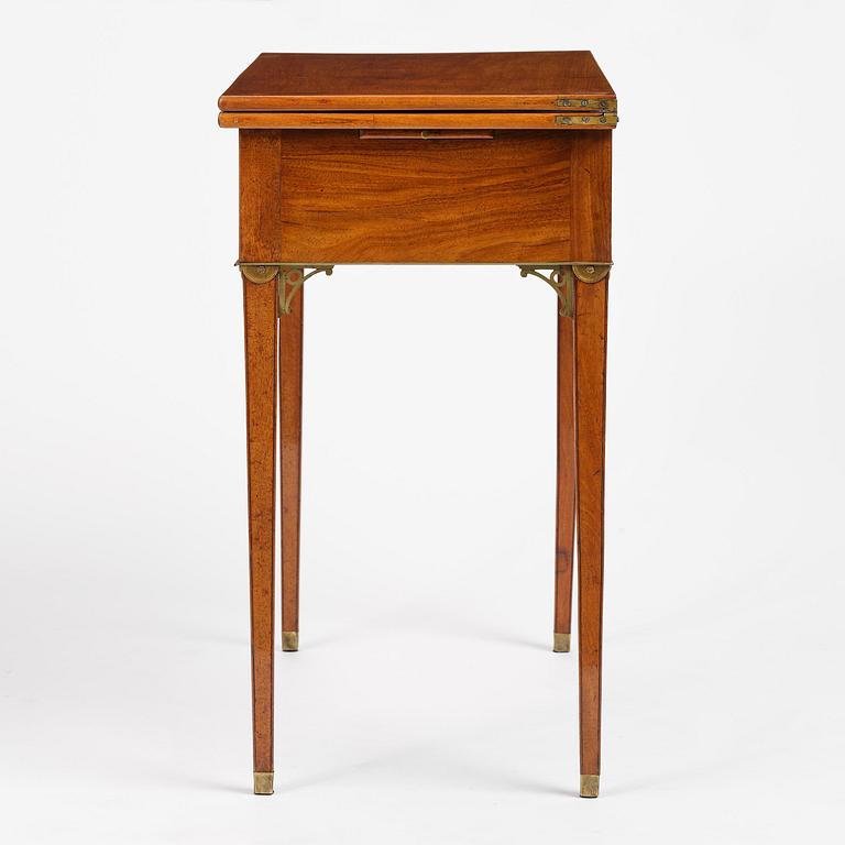 A late Gustavian mahogany games table, presumably by A. Nordström (Journeyman at G. Iwersson 1806-09).