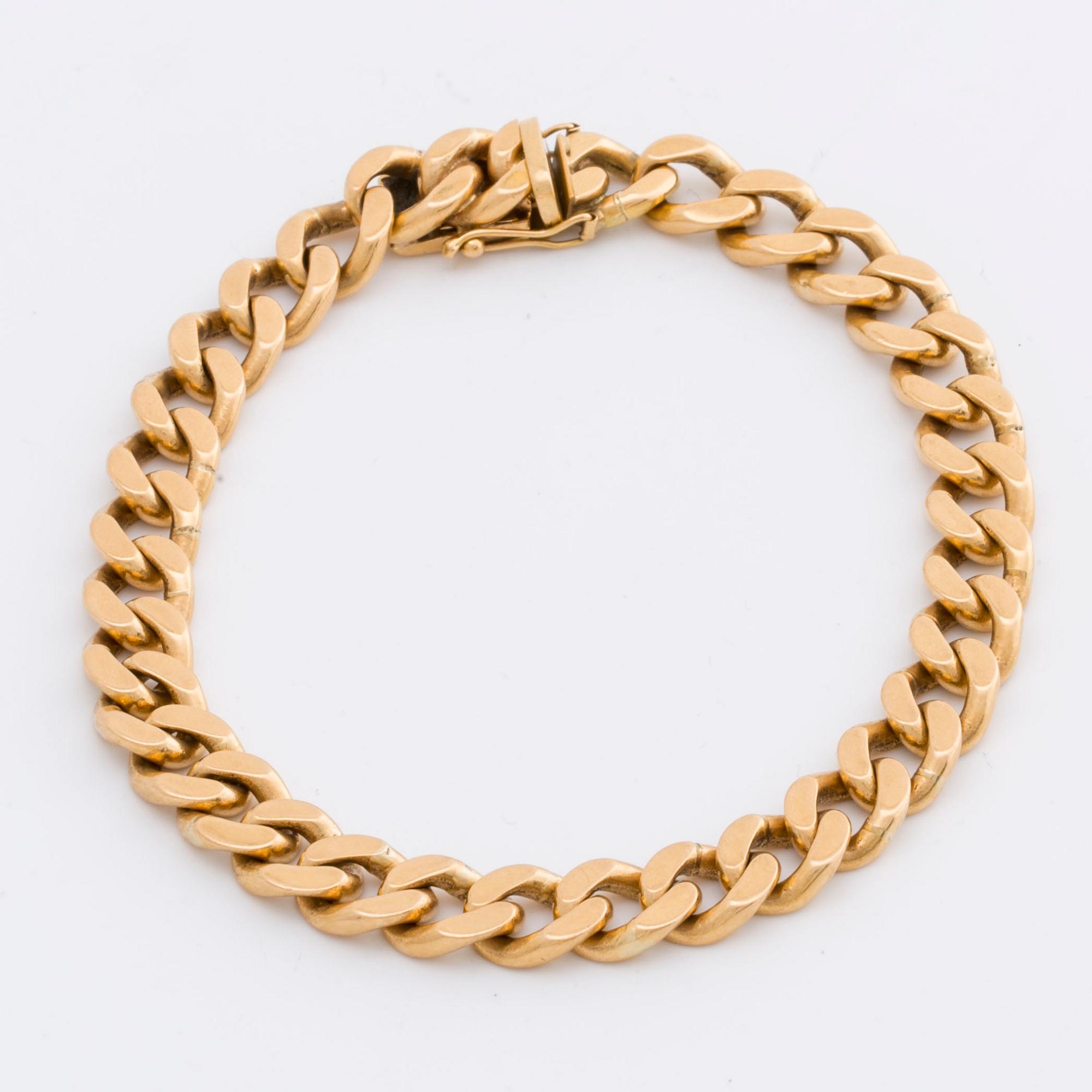 ARMBAND 18K guld pansarlänk, 57,0 g,  Jo-Ans Guld Köping 1978.
