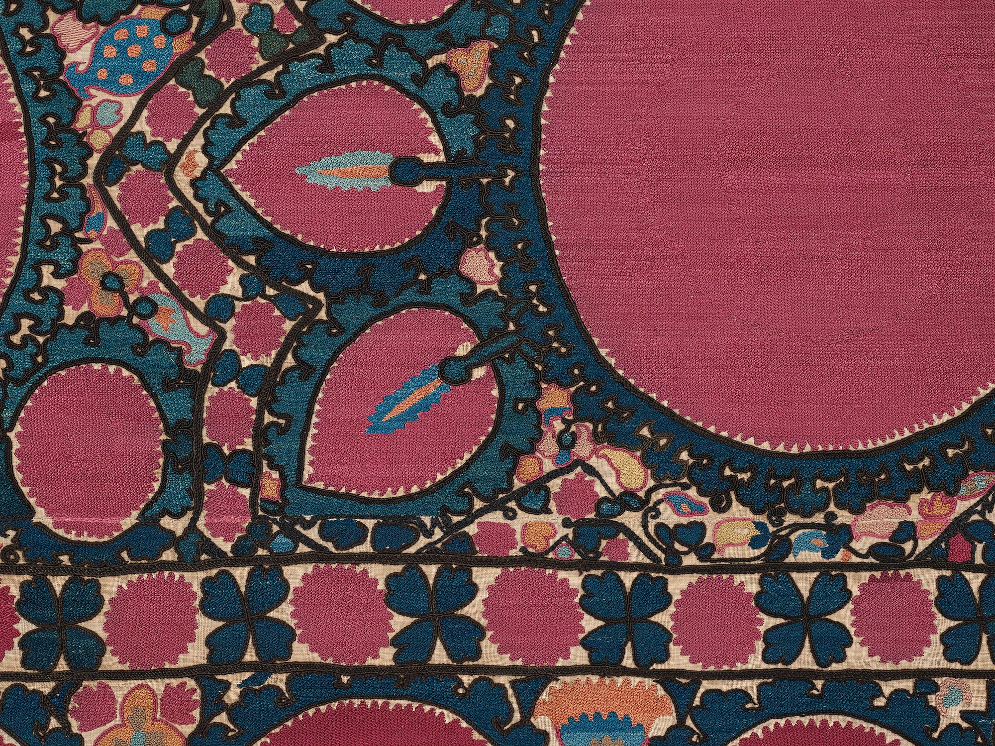 A SUZANI EMBROIDERY, an antique Tashkent, Uzbekistan, ca 217,5 x 112,5 cm.