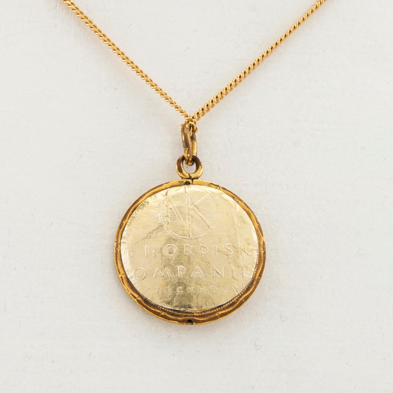 Halsband 18K guld med hänge av 8K guld.