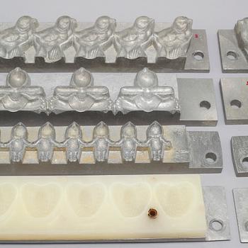 14 mid 20th century marzipan molds.