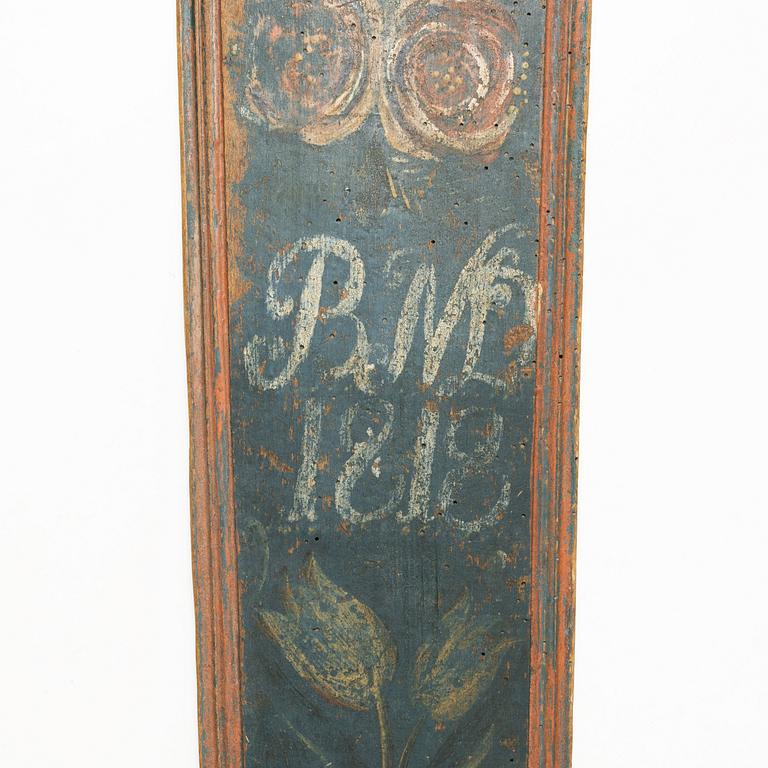 A painted wooden mangle board, Southern Sweden, dated 1818.