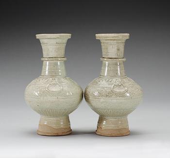 A pair of pale celadon glazed vases, Song/Yuan dynasty.