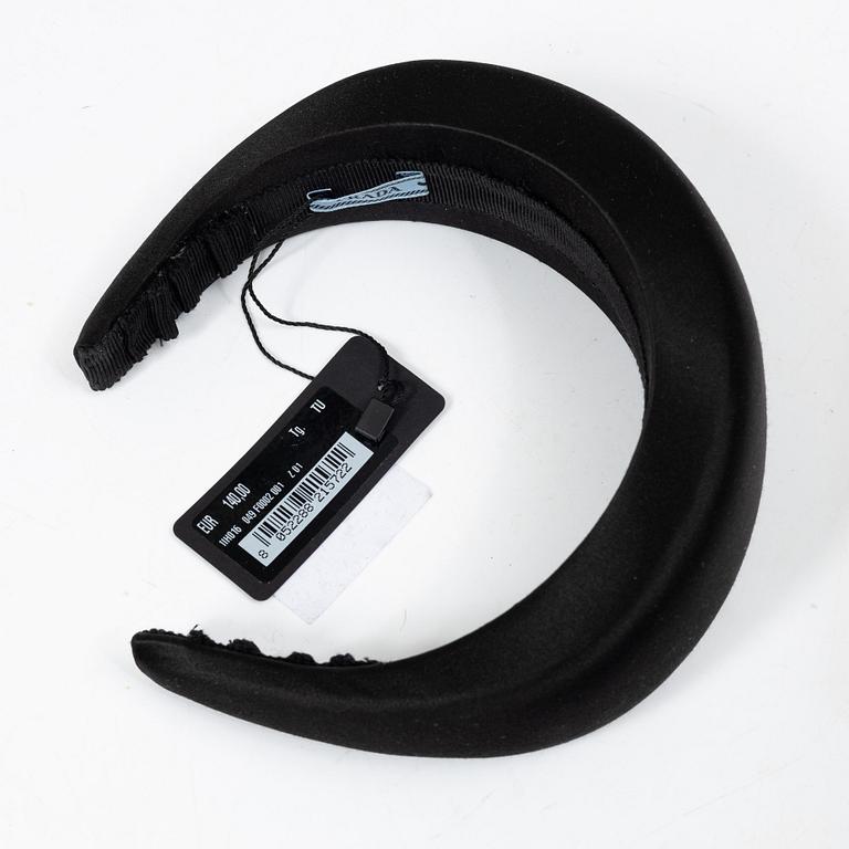 Prada, A black silk hairband.