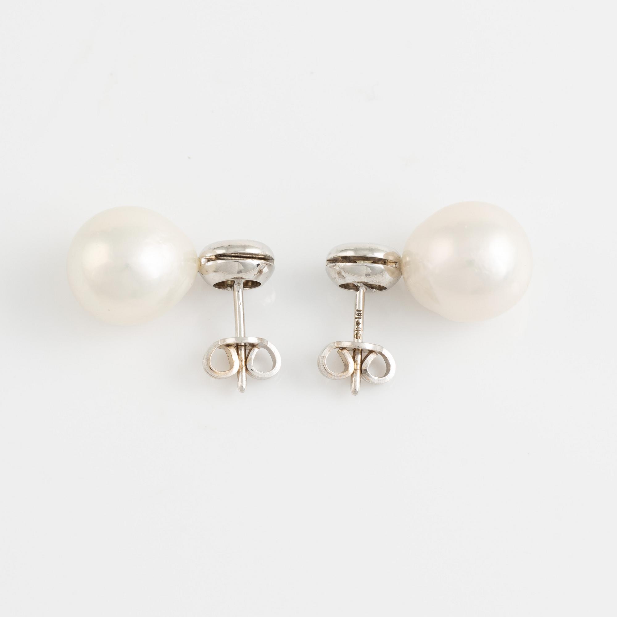 Örhängen med odlade sötvattenspärlor och gula prinsesslipade diamanter.