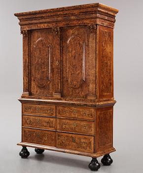 A Swedish late Baroque burr-alder cabinet, Stockholm, first part 18th century.