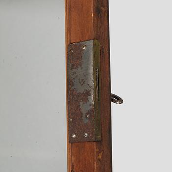 A mid-19th-century wall cabinet.
