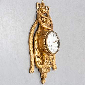 An 18th century Louis XV wall clock Jean-Petit L´Aine, Amsterdam.