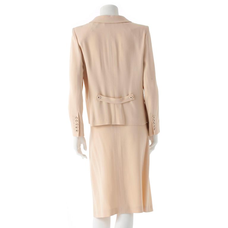 SONIA RYKIEL, a two-piece creme colored dress consisting of jacket and skirt.