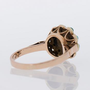 A RING, cultured pearl, cabochon cut turquoise, 14K gold. Eino Leppänen, Helsinki Finland 1959.