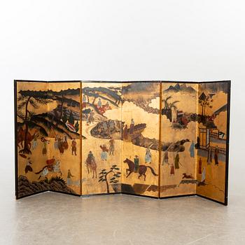 A Japanese 20th century folding screen.