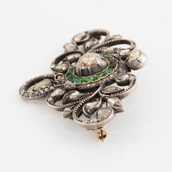 Gold and silver with rose cut diamond and emerald brooch.