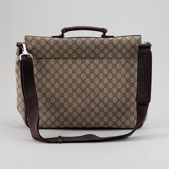 Gucci, a messenger bag.