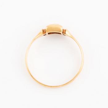 Faceted white stone ring.