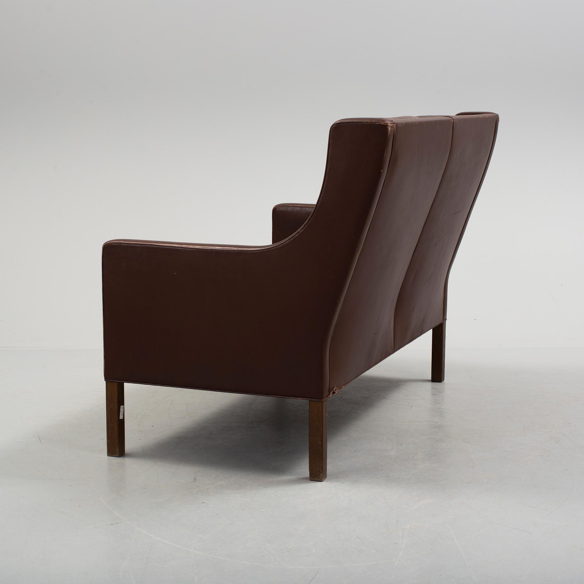 A two-seat leather sofa by Børge Mogensen for Fredrika Stolefabrik, Denmark.