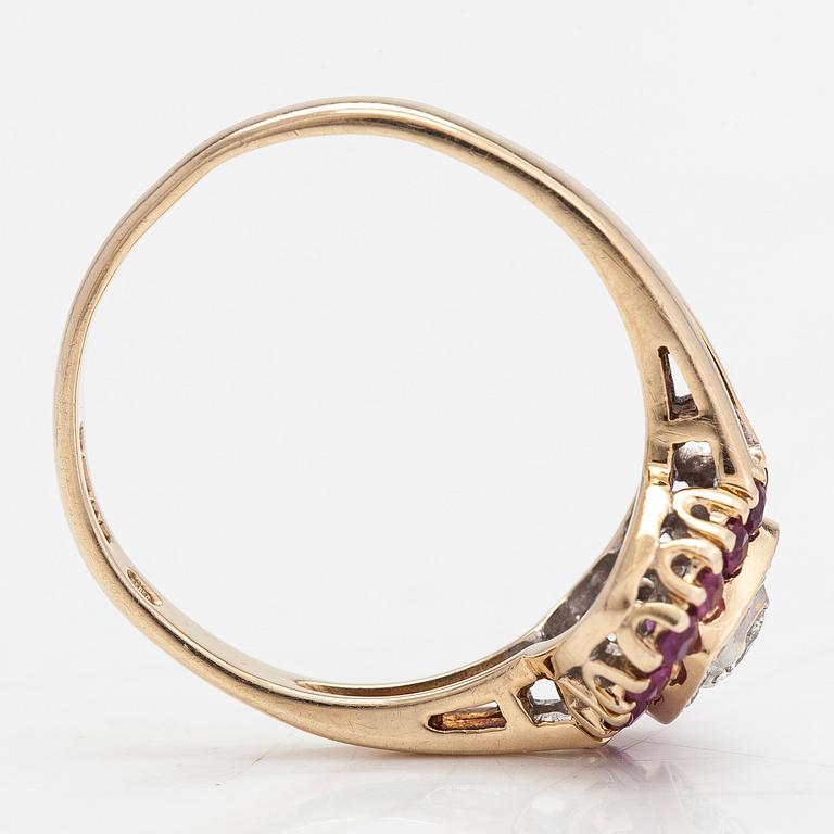 A 14K heart-shaped gold ring, with diamonds approx. 0.15 ct in total and rubies, London 1996.