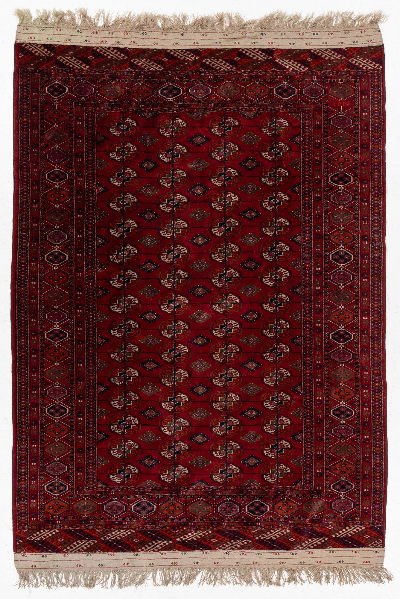 An old Turkmen carpet, c. 235 x 175 cm.