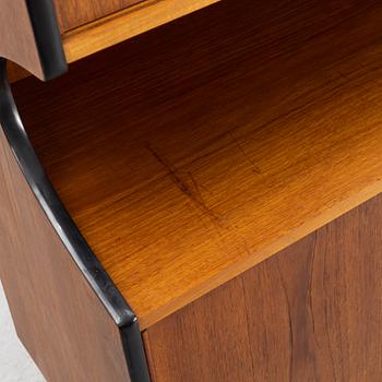 A teak-veneered bookcase, 1950's.