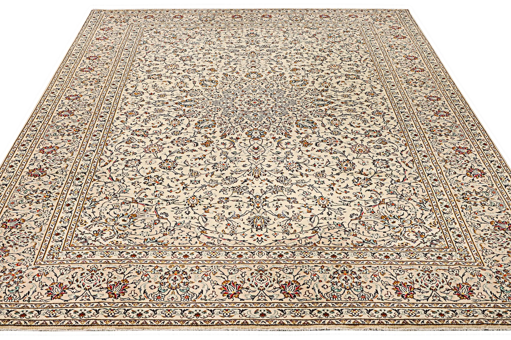 A Kashan carpet, a. 405 x 295 cm.